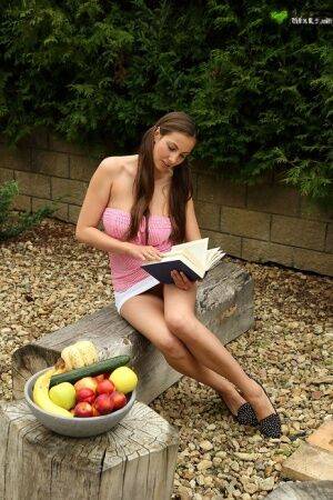 Amateur teen Connie Carter takes a study break to masturbate in garden on picsofsex.com