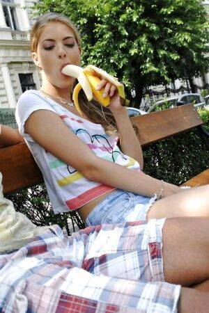Blonde girl eats a banana in public before blowing her boyfriend at home on picsofsex.com