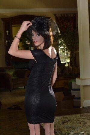 Admirable sweetie in nylons and glam dress slowly uncovering her petite curves on picsofsex.com