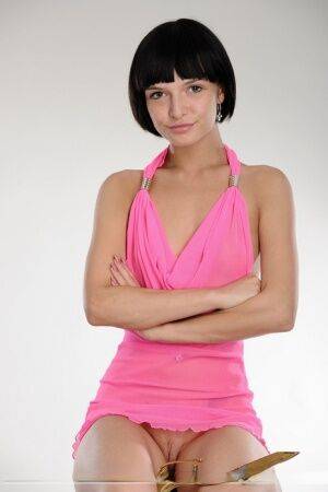 Short haired girl Fanny S casually exposes her shaved vagina in solo action on picsofsex.com
