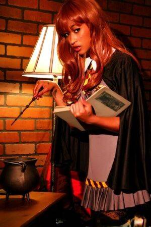 Super sexy redhead cosplay beauty Skin Diamond flaunts bare ass in costume on picsofsex.com