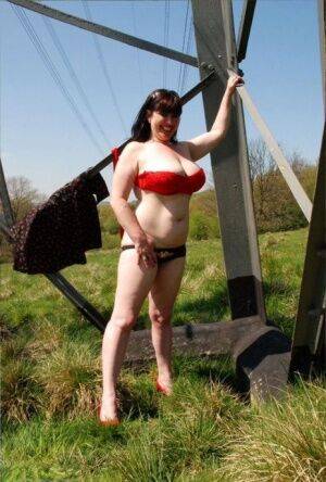 UK amateur Juicey Janey gets naked in heels underneath a hydro tower - Britain on picsofsex.com