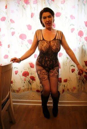 Amateur woman Juicey Janey shows her snatch in a crotchless bodystocking on picsofsex.com