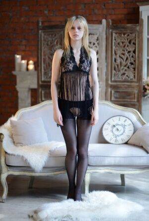 Enticing young Angelika D posing in sheer lingerie for her VIP lover on picsofsex.com