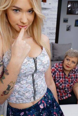 Naughty granny seduces a young girl for her first lesbian experience on picsofsex.com