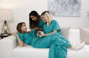 Teen lesbians remove scrubs and socks before an all girl threesome on picsofsex.com