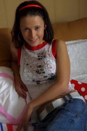 Petite teen takes a cumshot in mouth after sex with her pants pulled down on picsofsex.com