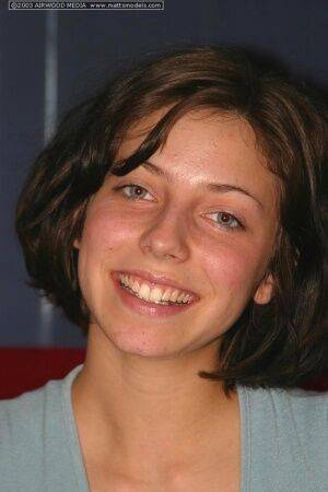 Brunette teen Nico folds back her labia lips after a striptease on picsofsex.com
