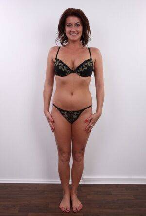 First timer takes off her clothes 1 item at a time until she's standing naked on picsofsex.com