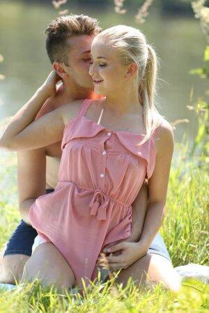 Cute blonde Cayla Lyons fucks her boyfriend next to a peaceful river on picsofsex.com