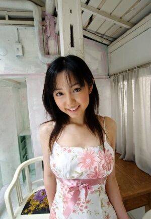 Sweet Japanese teen Yui Hasumi wears a smile while showing her hairy bush - Japan on picsofsex.com