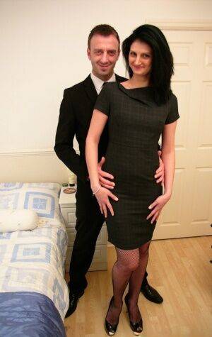 Dark-haired amateur Eva Johnson submits to a gentleman in mesh hosiery on picsofsex.com