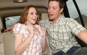 Redhead cutie Scarlett Fay reveals her tits and gives a blowjob in the car on picsofsex.com