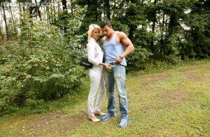 Clothed blonde out for a walk finds herself a cock that needs a blowjob on picsofsex.com