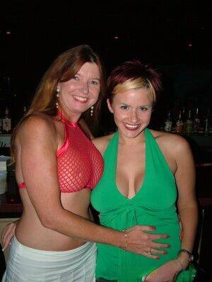 Mature woman Dee Delmar has lesbian relations at a swinger's club on picsofsex.com