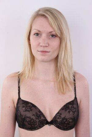 Blonde girl Klara doffs a T-shirt and black leggings for her nude premiere on picsofsex.com