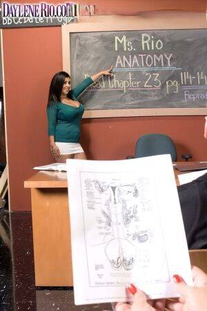 Hot Latina teacher Daylene Rio gives a student sex lessons in class on picsofsex.com