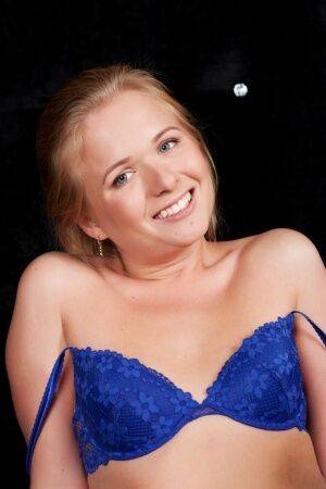 Teen model Lanna removes a bra and lace panties to pose nude on picsofsex.com