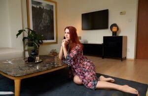 Natural redhead Charlie Red sets her beautiful teen body free of a dress on picsofsex.com