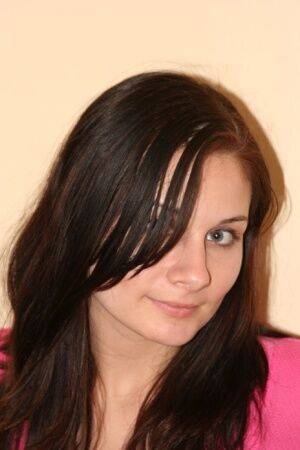 Amateur chick Corin doffs cute panties to get totally naked in the kitchen on picsofsex.com