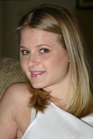 Blonde girl Chantelle uncups great tits before showing her bare ass and pussy on picsofsex.com