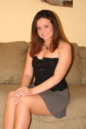 First timer removes black panties to model totally naked on fabric sofa on picsofsex.com