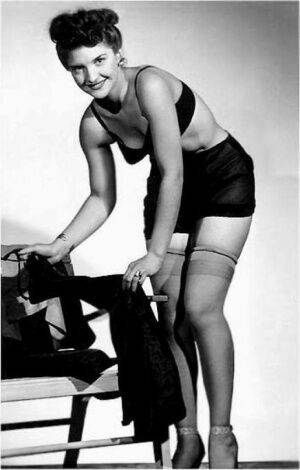 Models of yore removing bras and girdles to flaunt their stuff in vintage porn on picsofsex.com