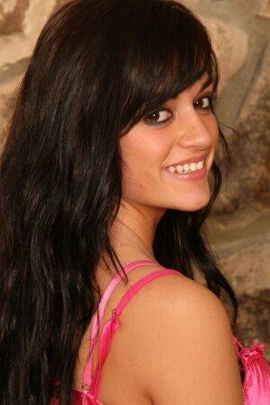Brunette amateur Vivian casts off pink lingerie to get naked in high heels on picsofsex.com