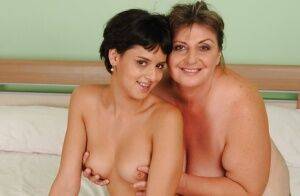 Naughty teen Coco de Mal has some fun with her mature lesbian friend on picsofsex.com