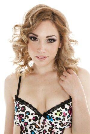 Amazingly lovely teen babe Lily Labeau stripping off her lingerie on picsofsex.com