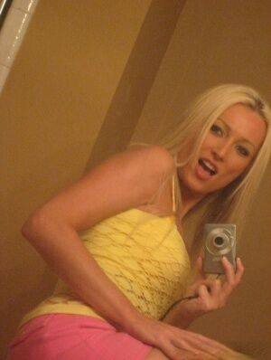 Blonde amateur Diana Doll gets naked for bathroom selfies on picsofsex.com