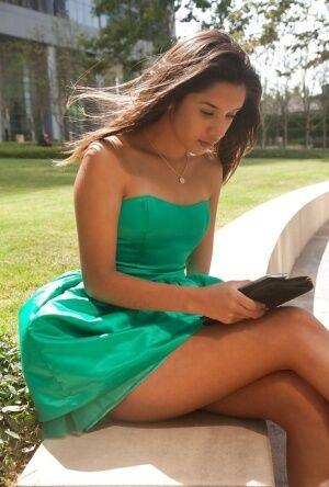 Cute amateur brunette Yesenia Corral giving us a view of her upskirt on picsofsex.com
