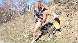 Chrissy Fox relieves her pee desperation outside on picsofsex.com