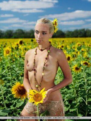 Amidst a large field of sunflowers in full bloom, Adele&39s natural beauty is on picsofsex.com