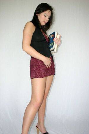 Amy loves to be a huge tease in her cute little school girl outfit on picsofsex.com