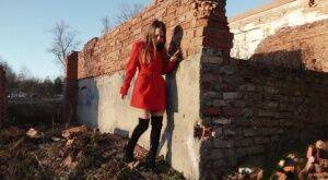 Caucasian girl Nastya takes a piss behind the remnants of a brick house on picsofsex.com