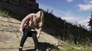 Blonde girl Nastya pulls down her pants for a badly needed pee in the outdoors on picsofsex.com