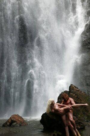 Stunning milf Jesse Jane fucks outdoor in the waterfall on cam on picsofsex.com