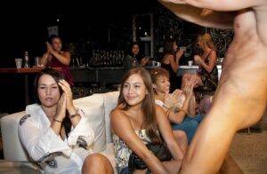 Splendid girls have fun with a dancing bear on a wild clothed party on picsofsex.com