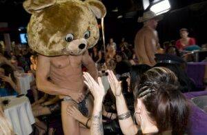 Clothed chicks please a dancing bear on a non nude wild party on picsofsex.com