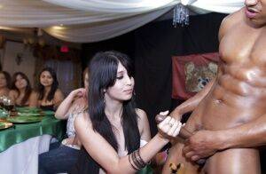 Interracial party with a hot muscular stripper and wild chicks on picsofsex.com