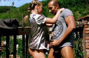 Kinky blond chick and her equally freaky man friend piss on each other outside on picsofsex.com