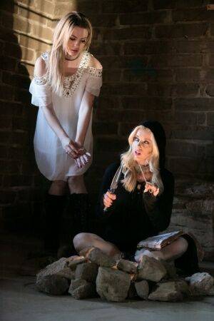 Fully clothed teens Dahlia Sky and Charlotte Stokely model in cosplay garb on picsofsex.com