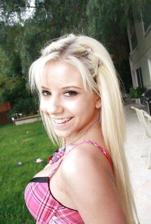 Tiny blonde teen Tessa Taylor revealing nice tits and tit ass on lawn on picsofsex.com