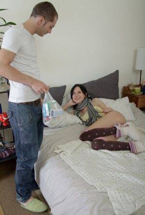 Young girl Alice loses her virginity in a painful manner in OTK socks on picsofsex.com