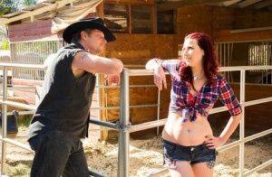 Redhead farm girl Alice Chambers gets banged by a ranch hand in her boots on picsofsex.com