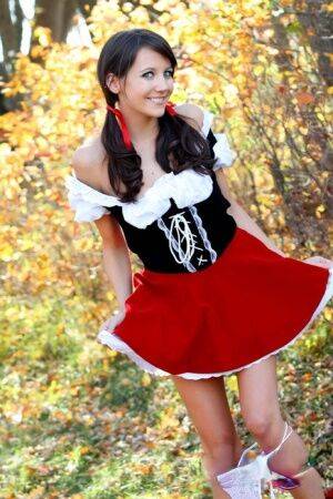 Sweet teen Andi Land frees her tits and twat from a Red Riding Hood outfit on picsofsex.com