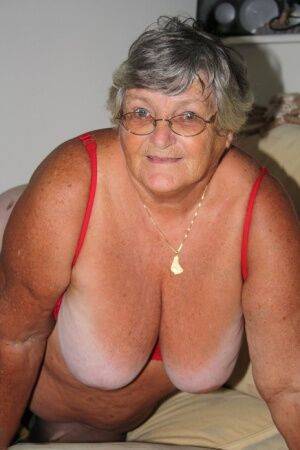 Morbidly obese nan Grandma Libby licks a nipple before spreading her cunt on picsofsex.com