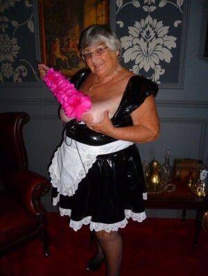 Fat old maid Grandma Libby doffs her uniform to pose nude in stockings on picsofsex.com