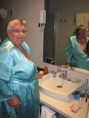 Morbidly obese woman Grandma Libby shaves before taking a bubble bath on picsofsex.com